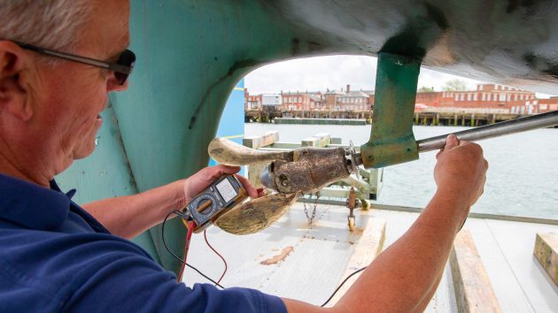 Testing for electrical continuity on underwater metals. Photo: Graham Snook