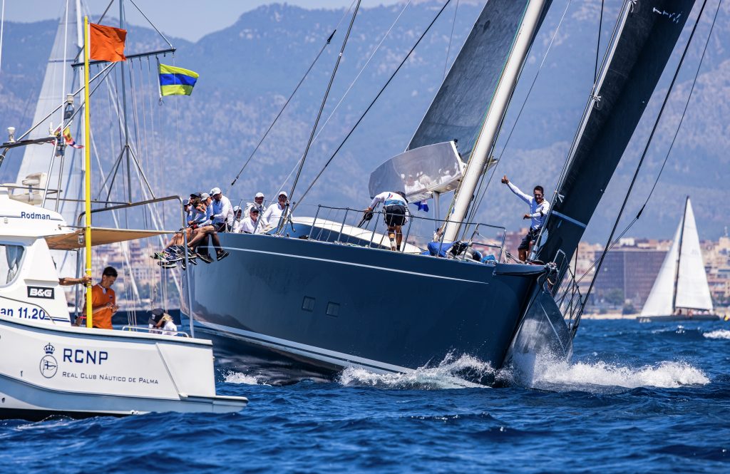 Superyacht Cup Palma 2021, a yacht approaches the start line.