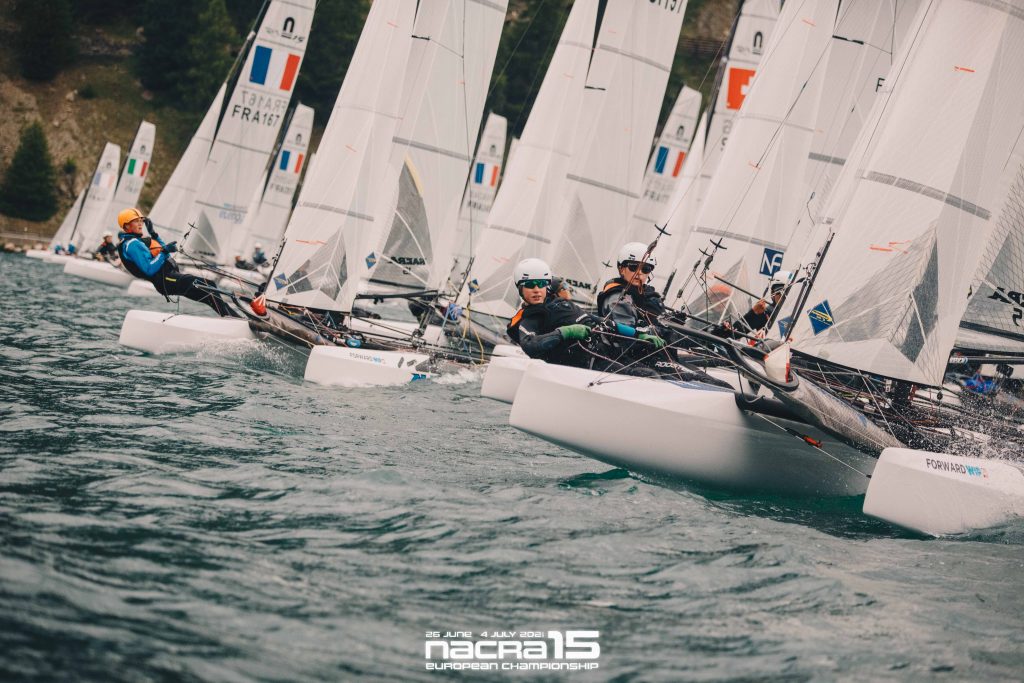 Boats after the start racing upwind