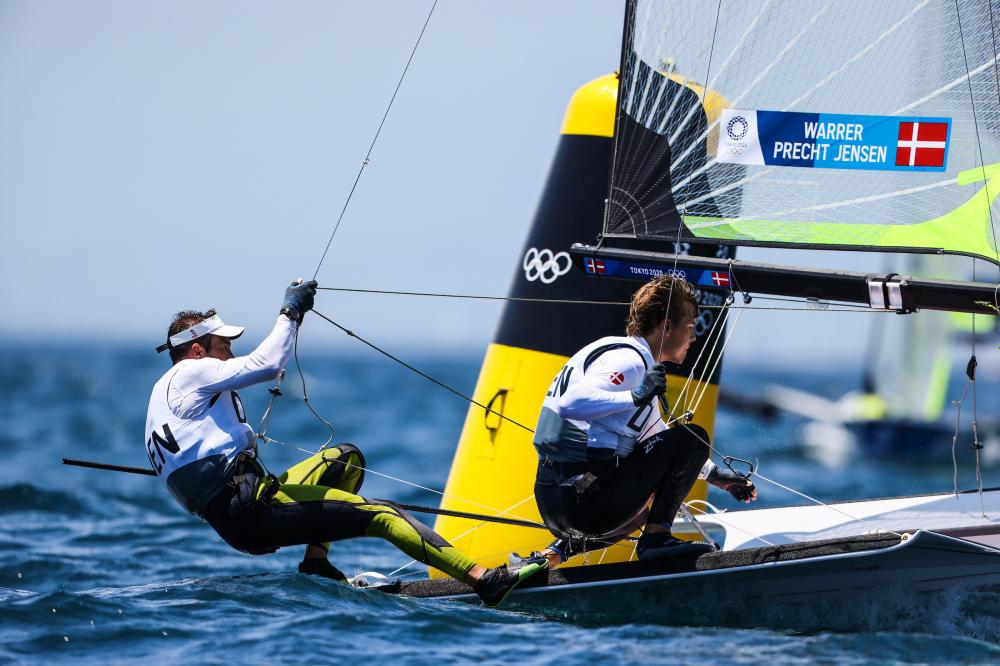 Jonas Warrer and Jakob Precht Jensen (DEN) rounding a mark in the 49er