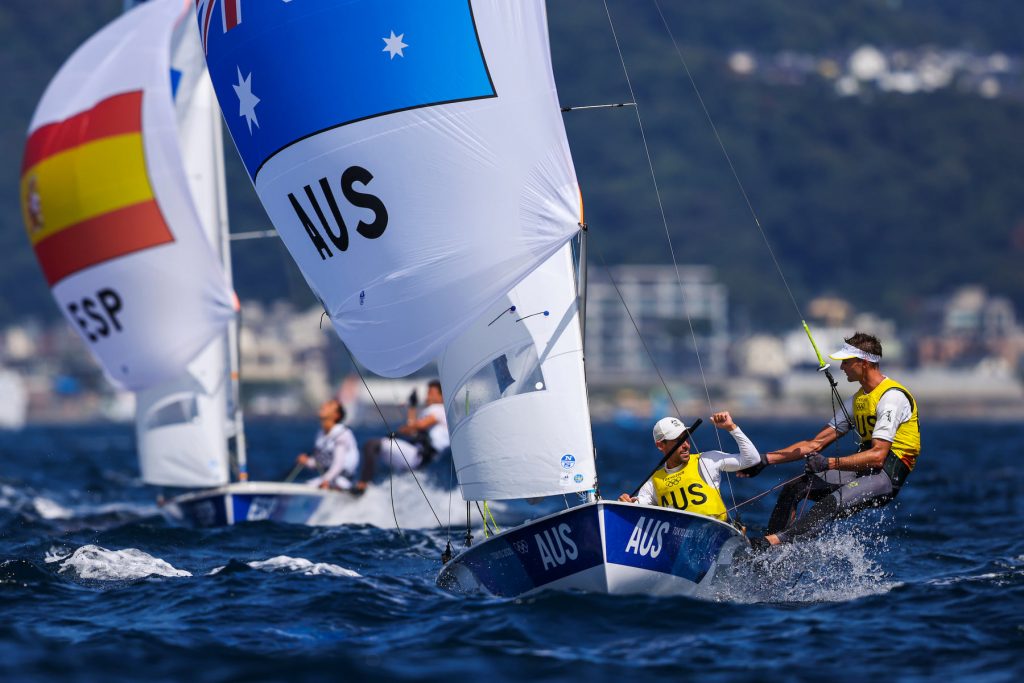 470 sailors Mat Belcher and Will Ryan celebrating their win after finishing a race