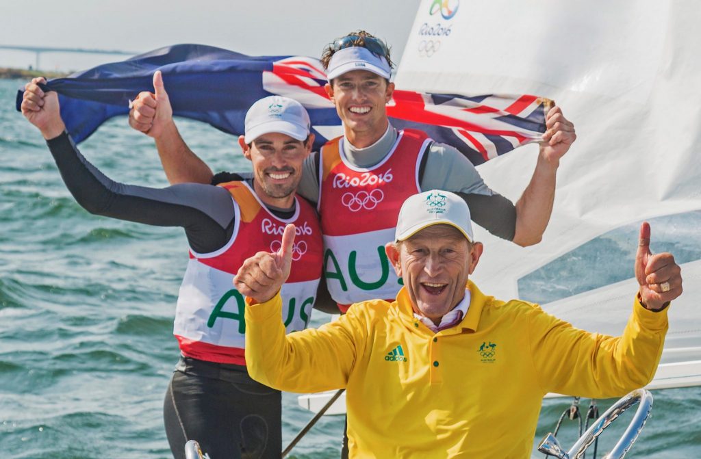 Victor Kovalenko, Mat Belcher and Will Ryan celebrating the silver medal at Rio 2016.