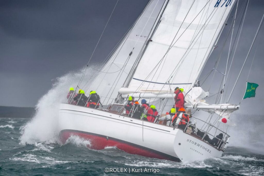 The classic 74ft 1961 ketch Stormvogel, skippered by Graeme Henry, smashes to windward after the start 