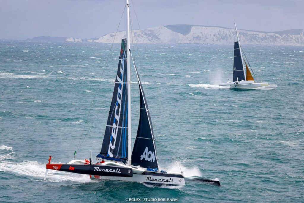 Giovanni Soldini's Multi70 Maserati and Jason Carroll's MOD 70 Argo exit the Solent