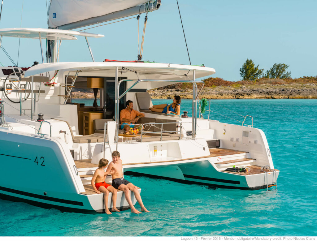 Family at anchor on a Lagoon 42