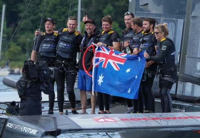 The Australian SailGP Team posing for a photo with Frederik, Crown Prince of Denmark.