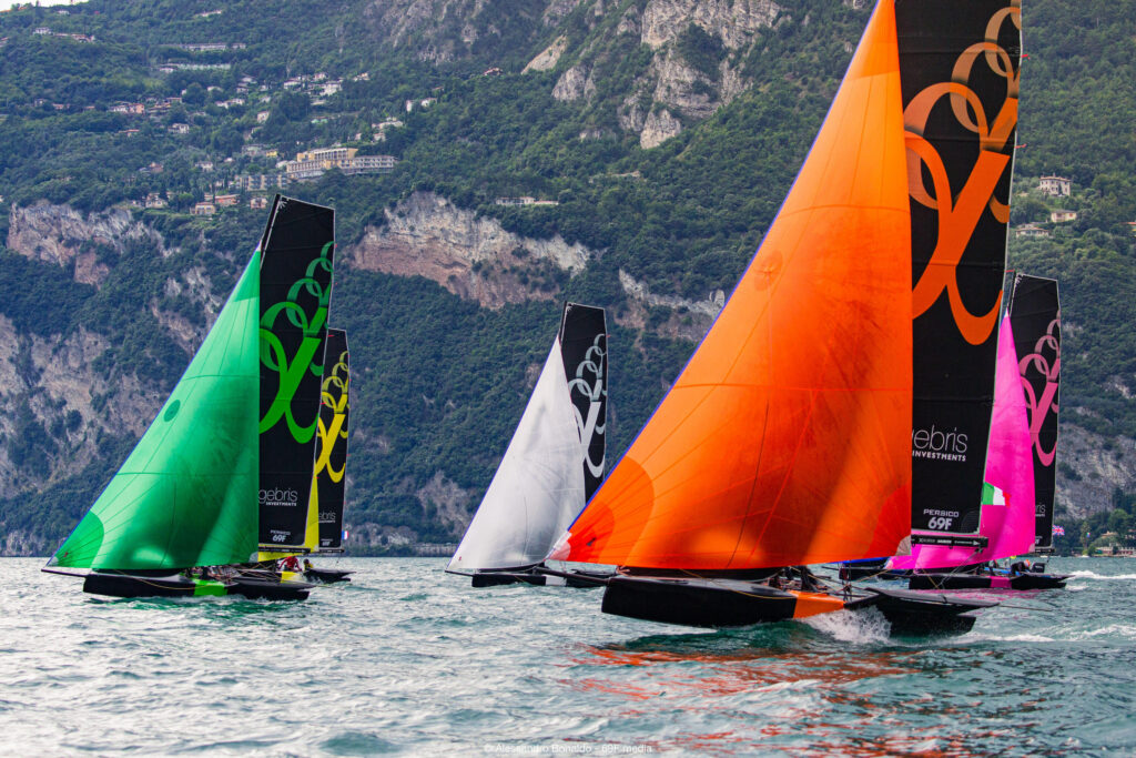 Four boats racing downwind the spinnakers.