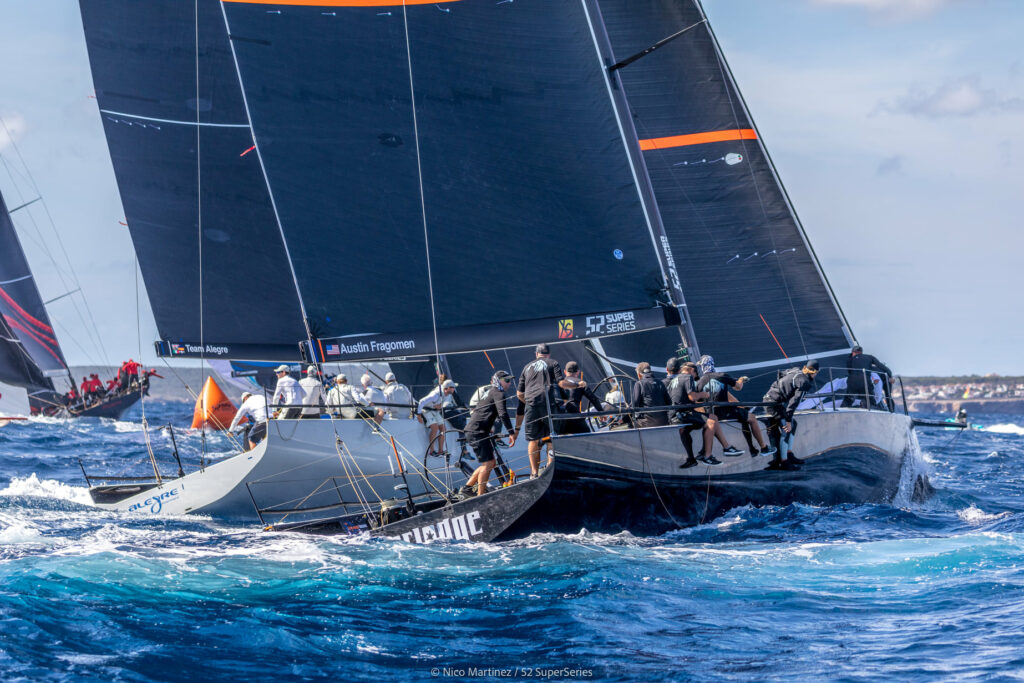 Alegre sailing upwind next to another boat. 