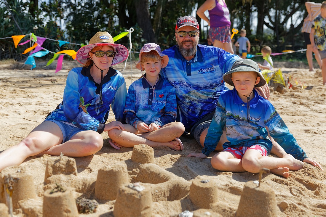 A family enjoying the sand castle competition.