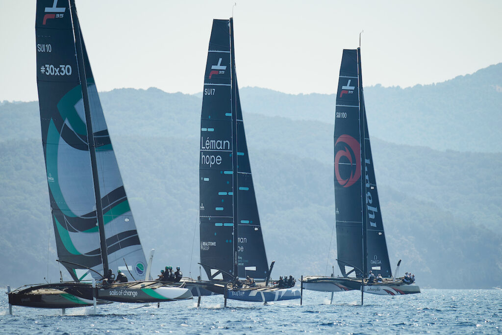 Three boats sailing upwind.