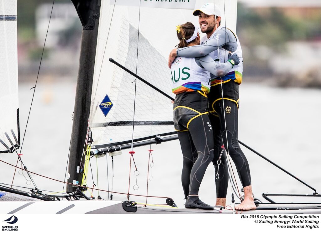 Lisa Darmanin and Jason Waterhouse embracing on the boat at the Rio Olympics.