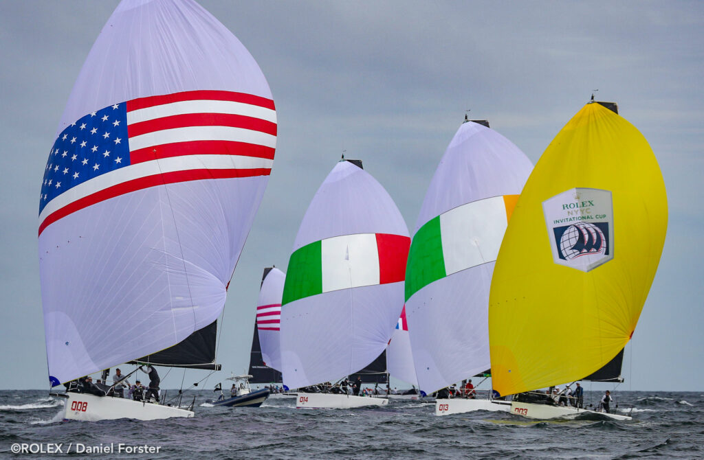 Five boats on a kite run.