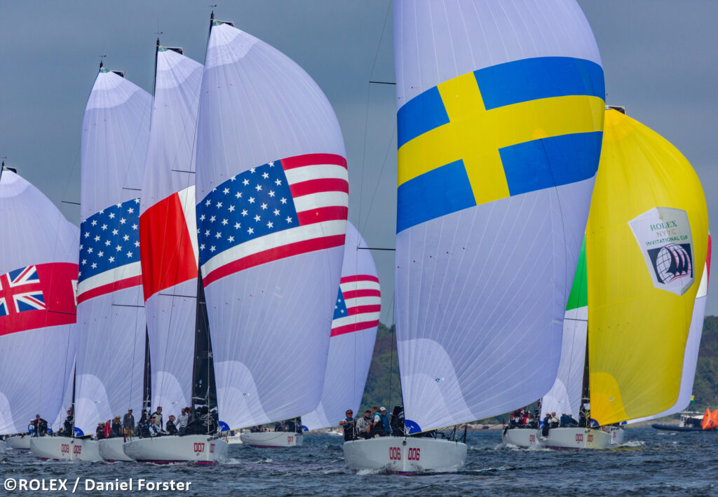 Fleet sailing downwind. Swedish yacht leading the fleet.