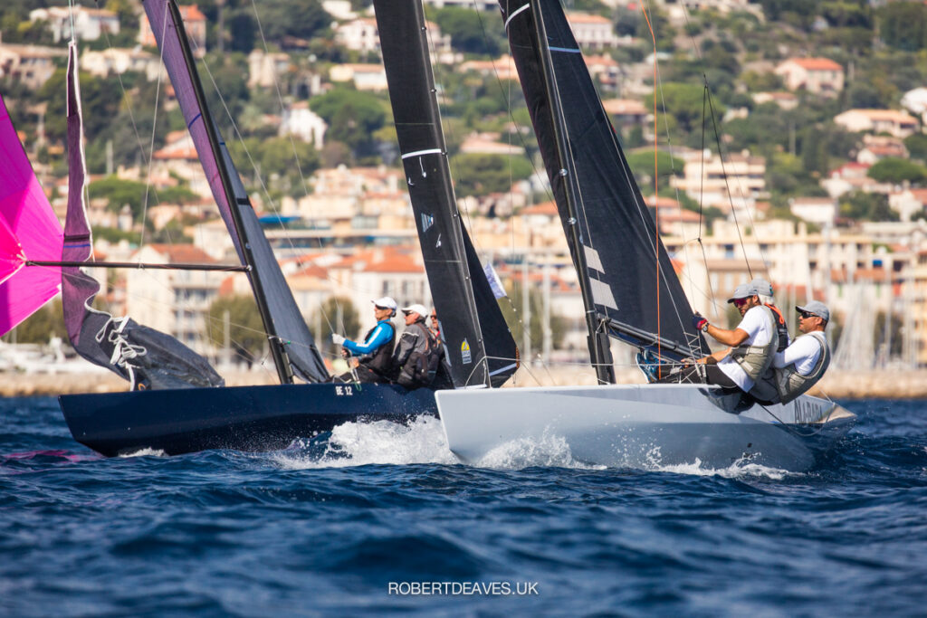 Ali Baba on a spinnaker reach next to Pungin who are flying a pink kite.