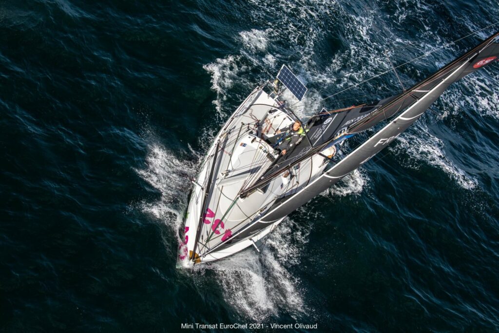 Aerial shot of Tim Darni sailing on his boat. 