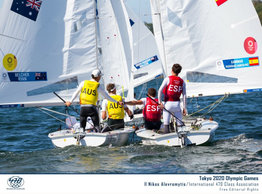 Mat and Will sailing downwind next to the Spanish team, congratulating each other.