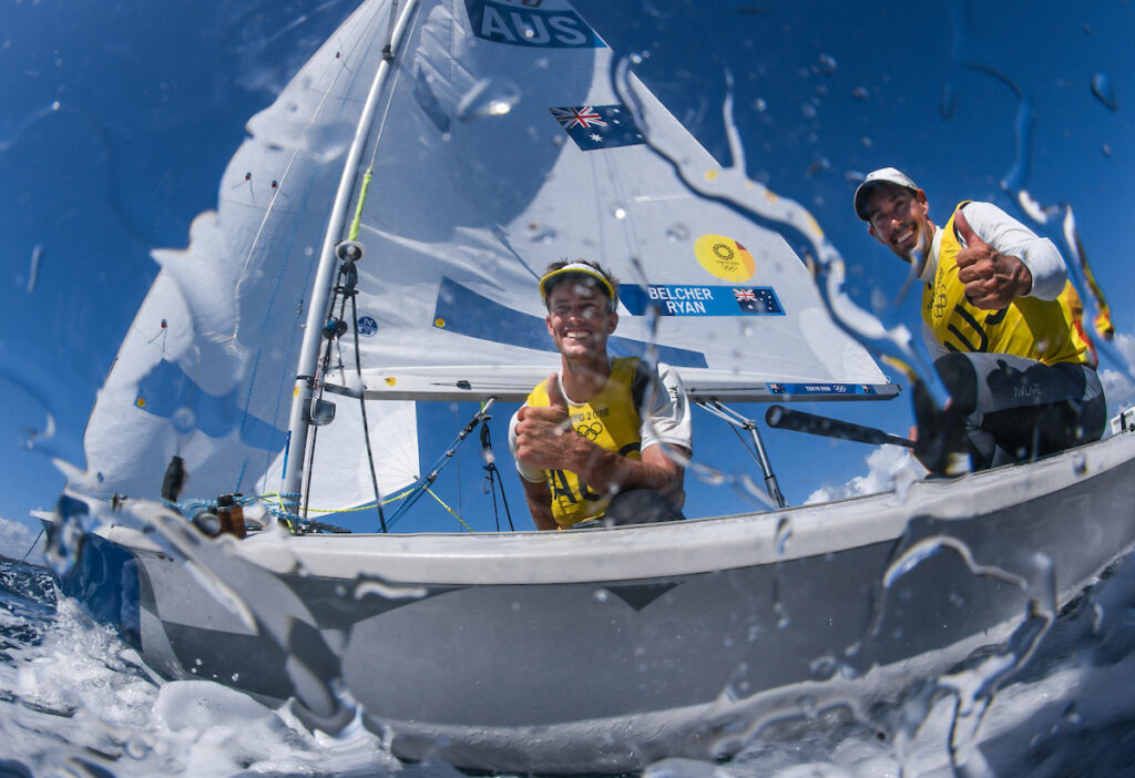 Will Ryan and Mat Belcher smiling into the camera in the water.