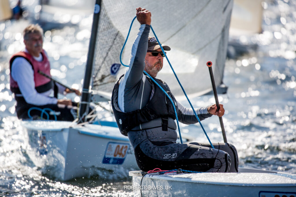 Greg Wilcox pulling on the mainsheet