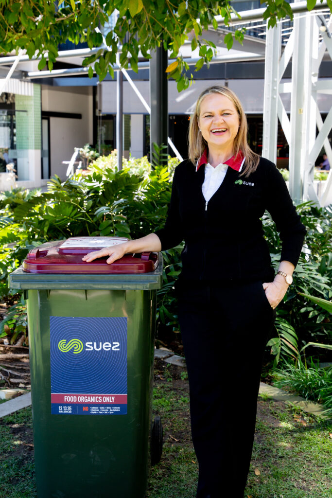 Liesl Hull next to a Suez bin.