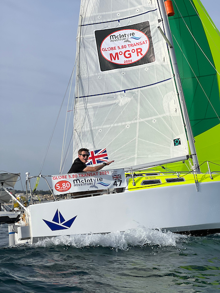 1/2 of Peter Kenyon's boat on a spinnaker reach.