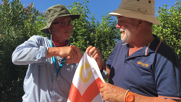 Neil Chapman and Don McIntyre shaking hands.