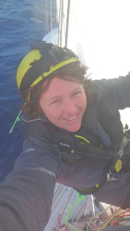 Selfie of Lisa Blair as she's climbing her mast in 2017.