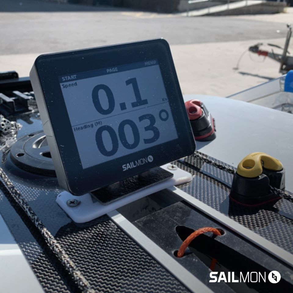 Sailmon MAX on the deck of a boat.