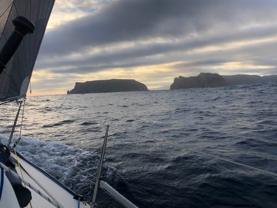 Salt Shaker sailing. Islands in the background.