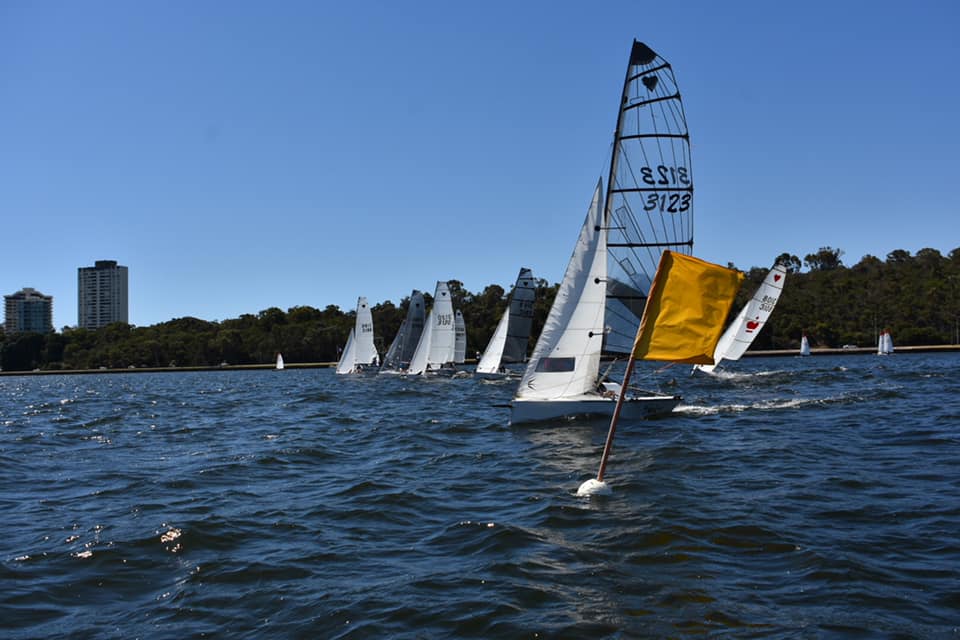 Fleet crossing the start line.