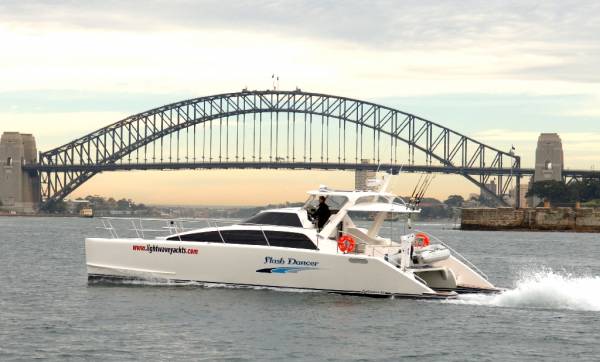 Lightwave 46’ Powercat with Harbour Bridge in the background.