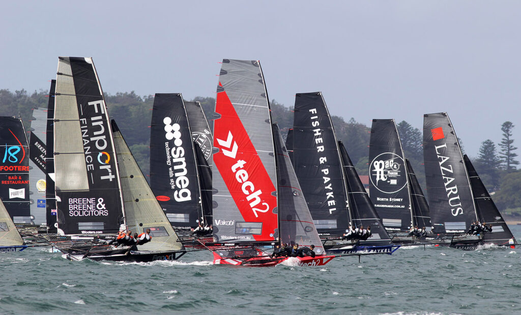 Fleet sailing upwind after the race start.