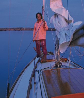 Suzan on Mystique (no sails up), getting dark.