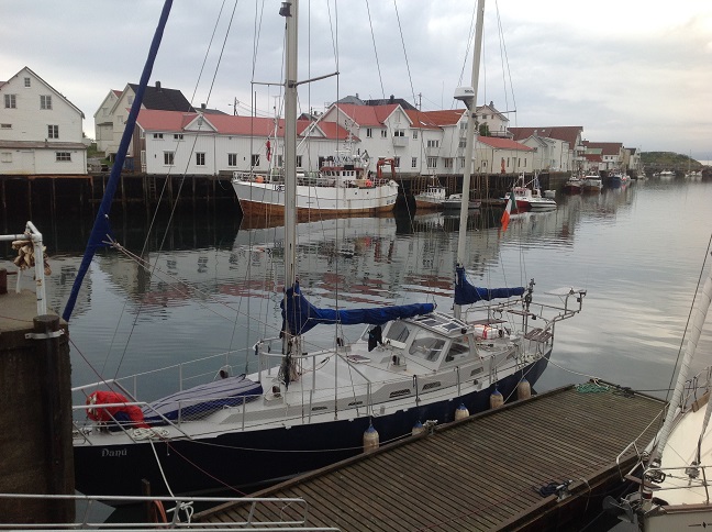 The yacht tied to the dock.