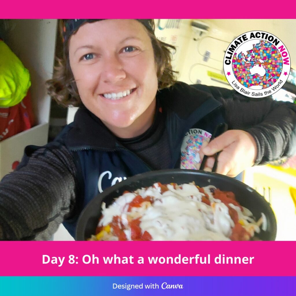 Lisa Blair selfie - holding frypan with vegan nachos.