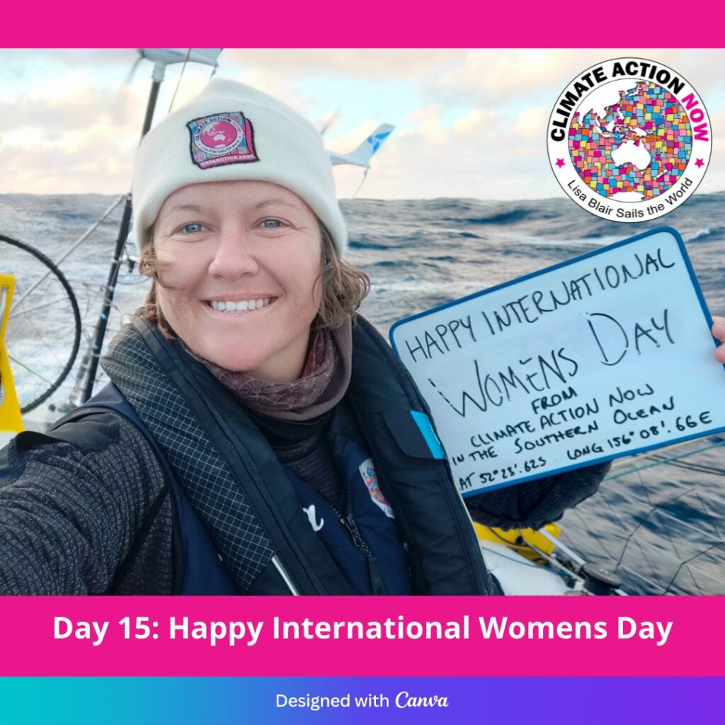 Lisa Blair selfie with IWD poster.