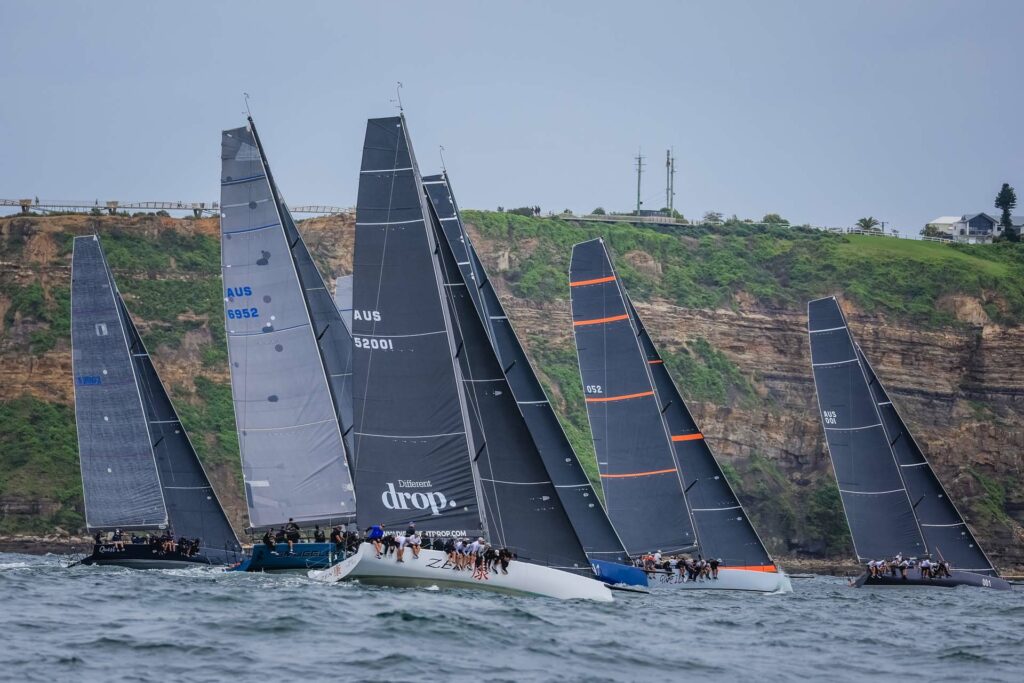 Fleet sailing upwind all on starboard tack.