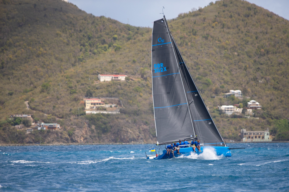 The Cape-31 Arabella sailing upwind through chop.