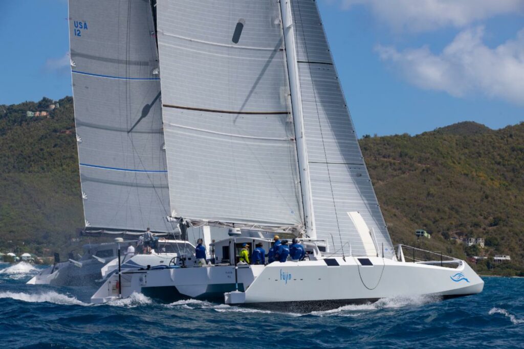 Fujin sailing upwind, another yacht to leeward.