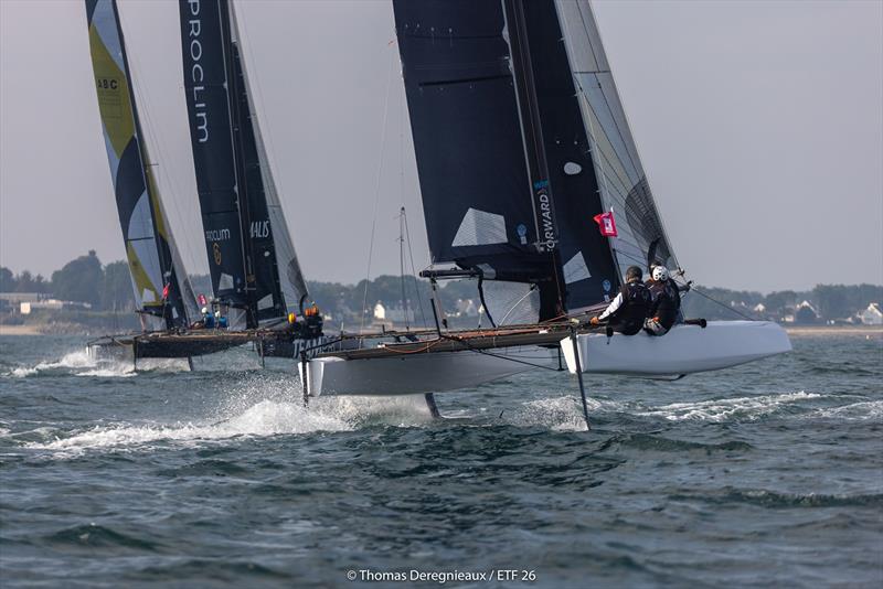 Three ETF26s sailing upwind.