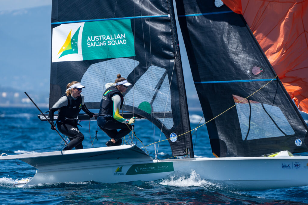 Laura Harding and Annie Wilmot. coming out of a spinnaker gybe.