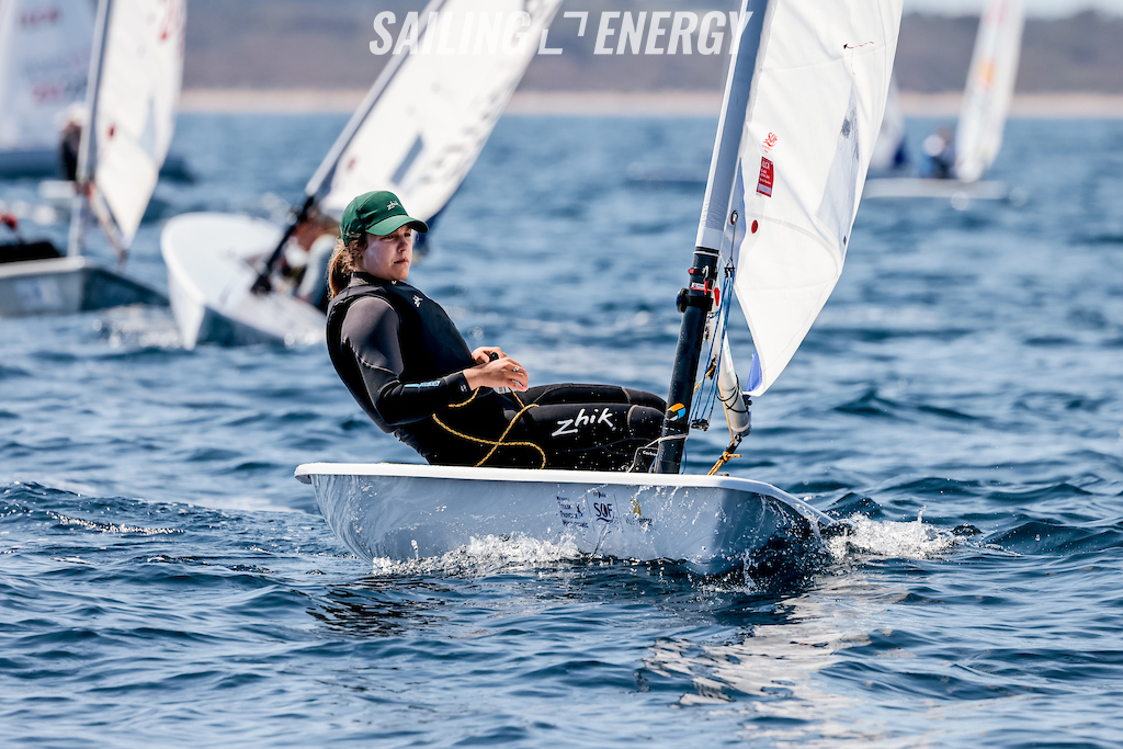 Casey Imeneo sailing upwind with boats behind her.