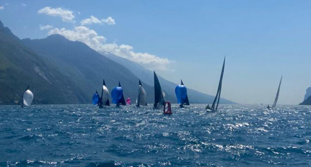 Fleet on Spinnaker run. Some boats still sailing up to top mark.