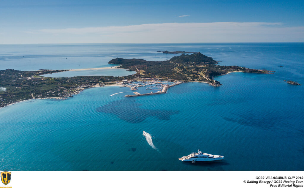 Aerial shot of Marina di Villasimius with the Notteri pond behind it and the neighbouring Capo Carbonara nature reserve.