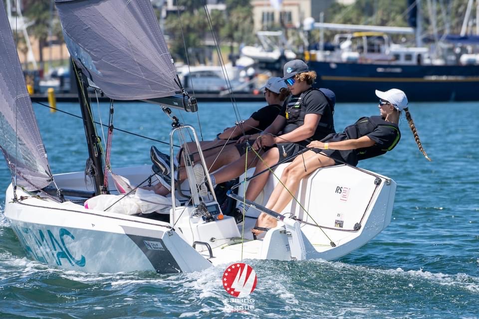 Zoe sailing upwind on keelboat.