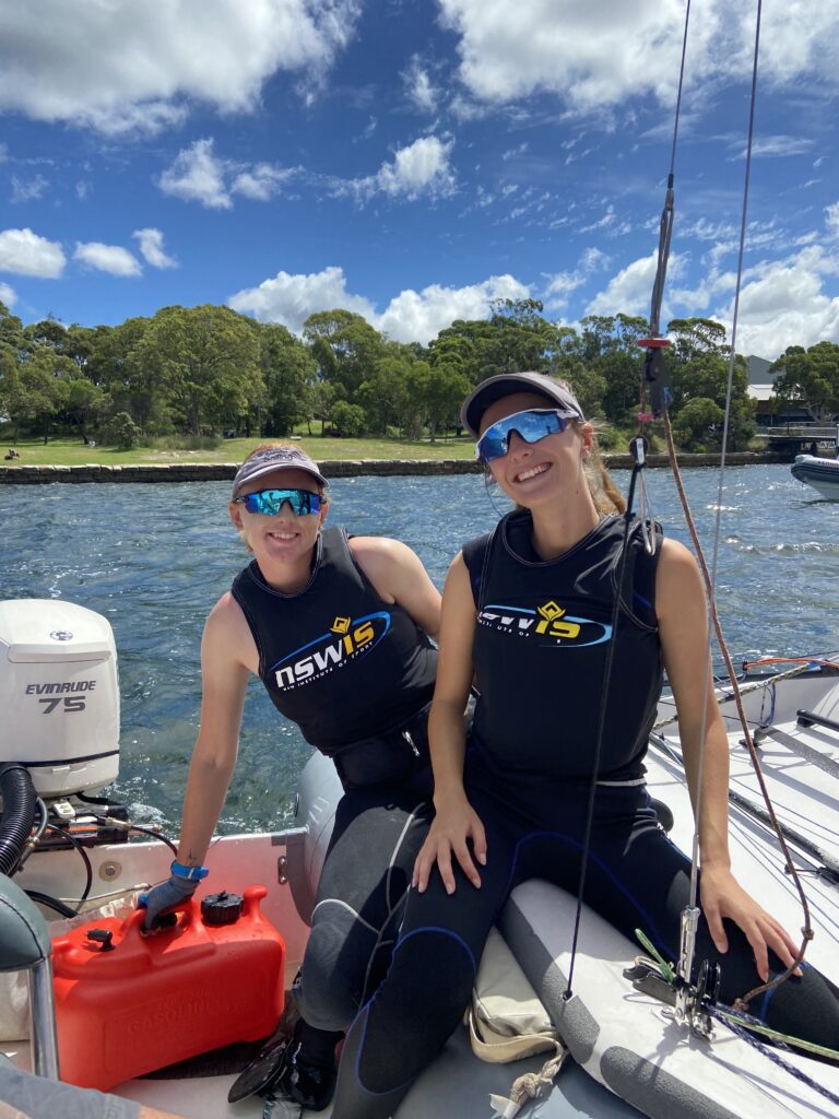 Zoe Dransfield (right) and Madeleine Mcleay sitting on 29er and RIB.