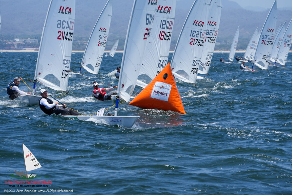 Finn Alexander rounding mark with fleet behind him.