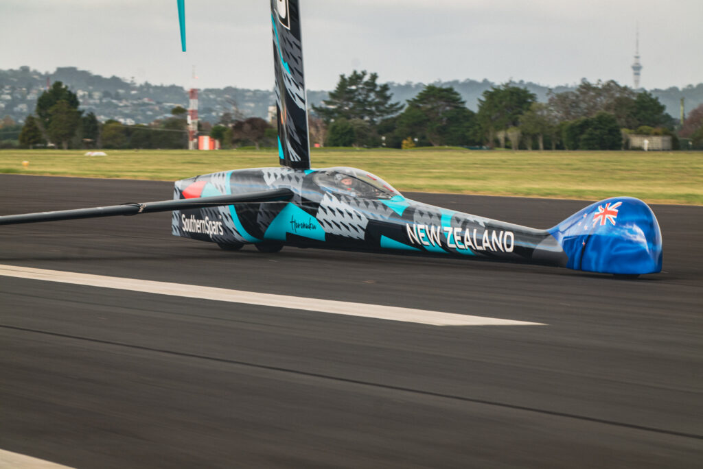 ETNZ land yacht making way on road.