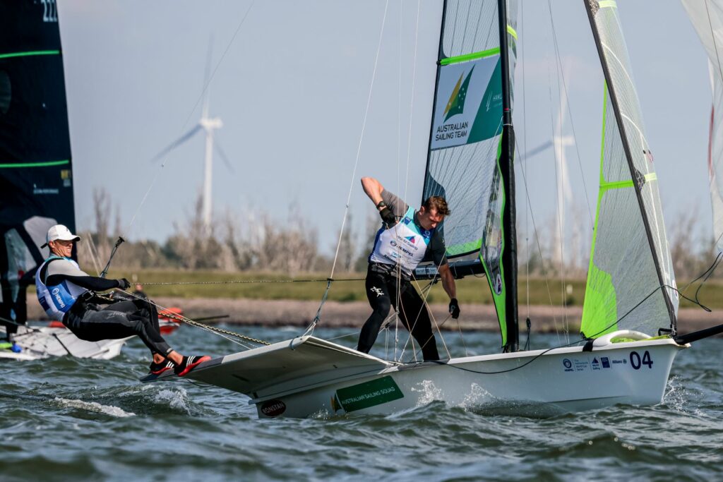 Tom Burton and Simon Hoffman - Burton on wire, Hoffman pulling up kite.