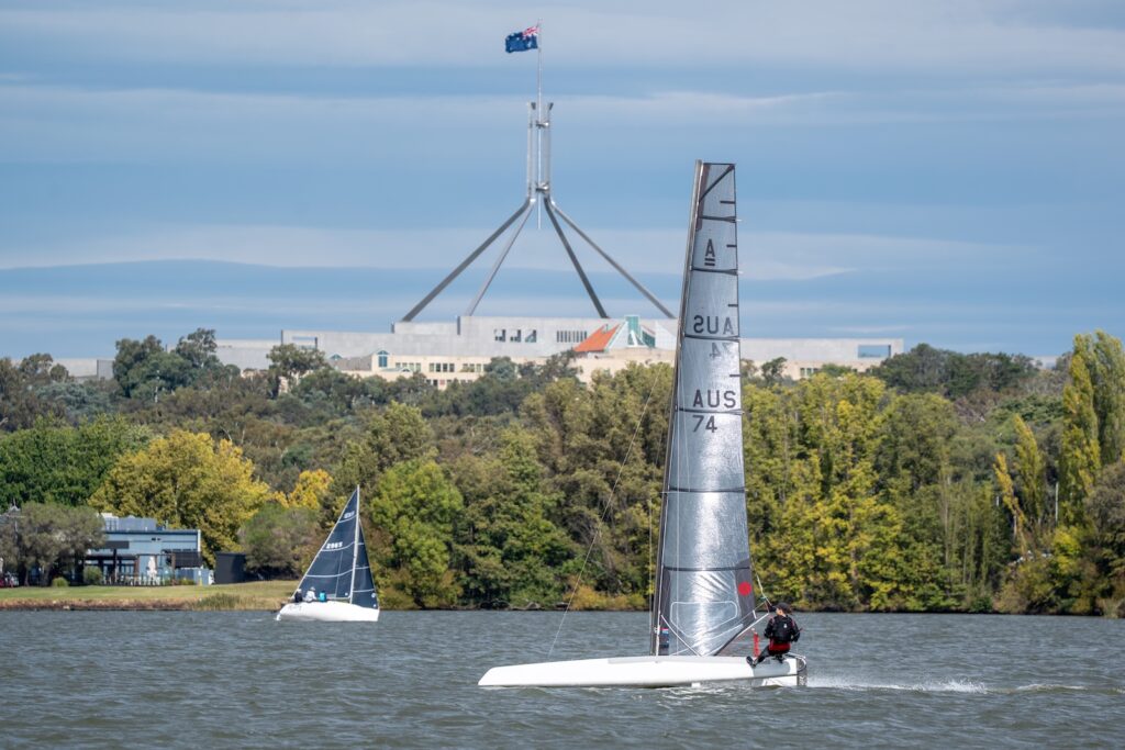 Racing on Lake Burley Griffin in front of Parliament House