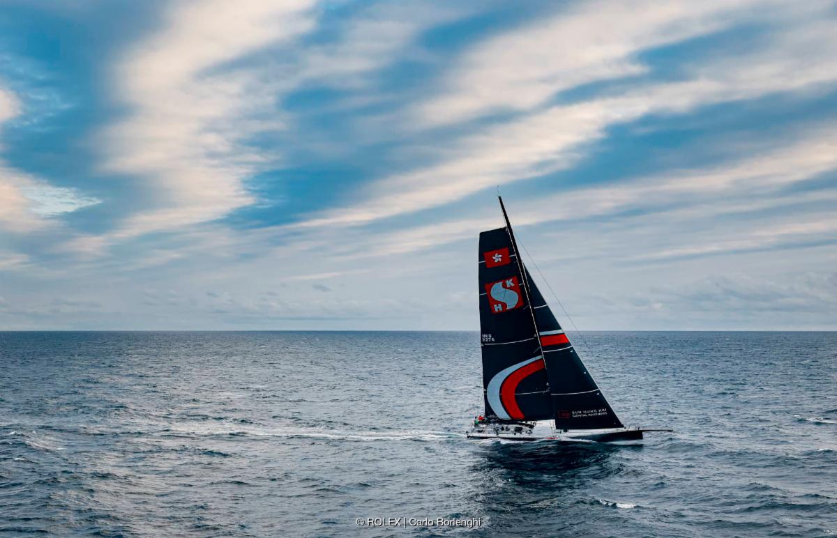 SHK Scallywag rounded the Fastnet Rock ahead of Black Jack 100 © ROLEX/Carlo Borlenghi